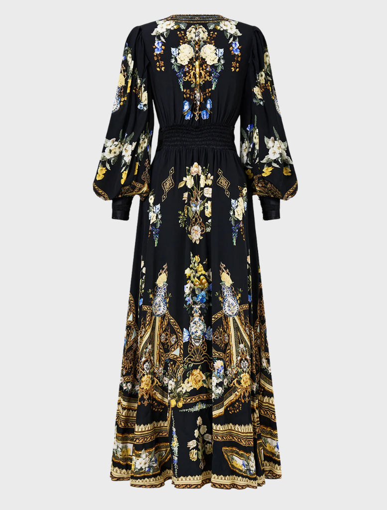 Dress with a shaped waistband and gathered sleeves, reflecting Ottoman elegance in a modern silhouette.