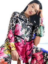 Vintage floral shirt with sheer overlay, ties, and buttoned cuffs, crafted in scattered daisies viscose satin for elegance.