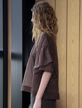 Elegant sheer blouse in chocolate color, featuring a modern design suitable for both casual and formal wear.