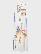 A white dress displaying a cheerful, colorful print across its surface.