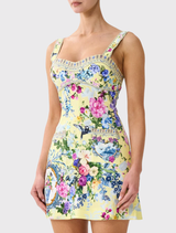 Elegant fitted short dress with topstitching, showcasing floral prints and crystal accents, perfect for a stylish occasion.
