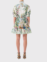 Flattering fit and flare short dress with shirred waist, elbow sleeves, and floral print inspired by Vienna's Schonbrunn Palace.