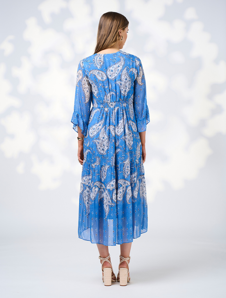 A blue dress with a colorful floral print, emphasizing its fashionable and cheerful appearance.