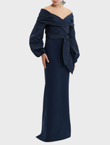 Sibylla Gown in navy, showcasing a chic bow on the shoulder for added flair.