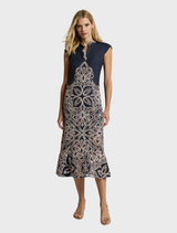 Elegant Sierra Midi dress in navy and blush, designed with a flattering silhouette for versatile wear at any occasion.