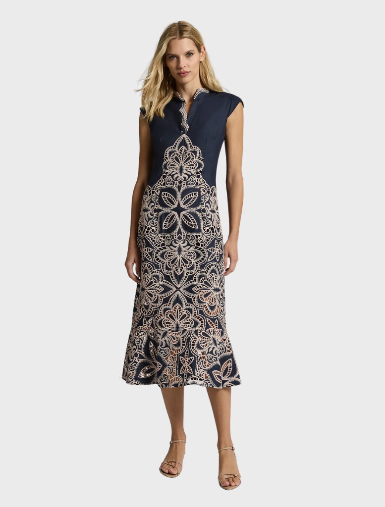 Elegant Sierra Midi dress in navy and blush, designed with a flattering silhouette for versatile wear at any occasion.