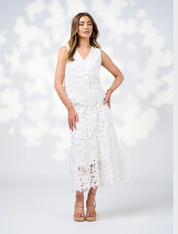 Elegant silk white lace dress made from soft, lightweight fabric, showcasing intricate lace details.