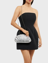 Elegant silver pleated clutch by Hollie, perfect for accessorizing formal wear or special occasions.
