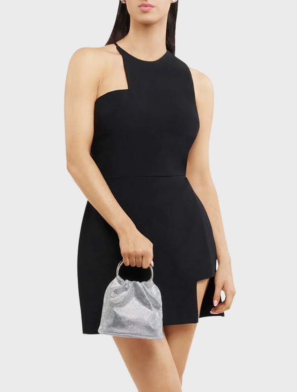 A stylish silver purse with a polished metal handle, perfect for adding a touch of elegance to any outfit.