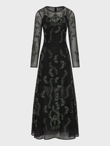 A-line dress in emerald green and black, featuring a flattering silhouette and elegant design suitable for various occasions.