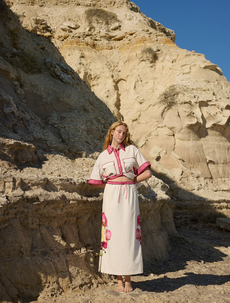 Antique Phalae Ava Skirt, displaying a charming floral print in soft tones, perfect for a classic and elegant outfit.