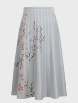 Pleated midi skirt by IVKO Woman, featuring a floral pattern in a soft viscose-cotton blend for comfort and elegance.