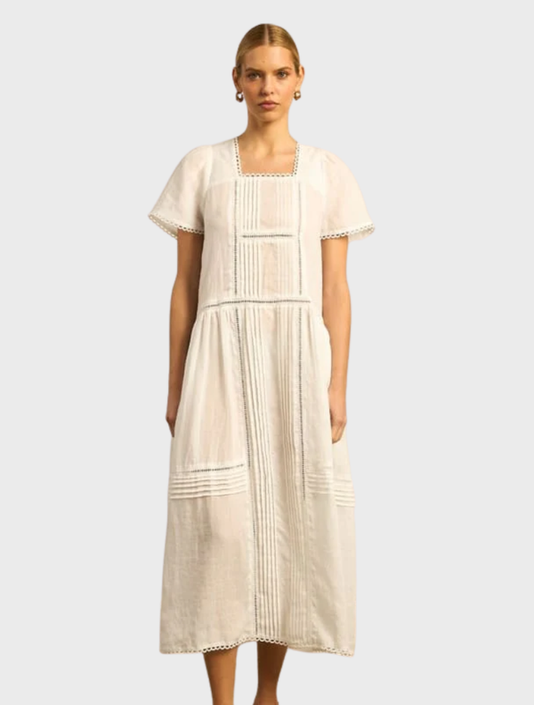 Skyscape Dress in Porcelain color, featuring a flowing design and elegant silhouette suitable for various occasions.