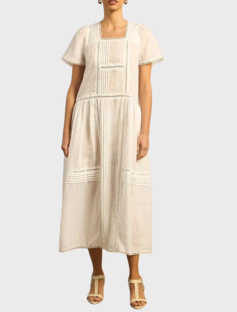 Porcelain Skyscape Dress showcasing a graceful silhouette, ideal for both casual and formal wear.