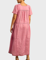 A chic dress adorned with a colorful skyscape design, featuring a blend of blue and pink tones for a fresh appearance.