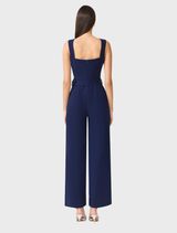 Stylish deep navy sleeveless jumpsuit by Leonara, featuring a fitted upper and wide legs for a contemporary look.