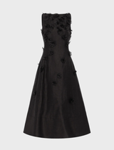 Sleeveless ebony midi dress by Cleo Petal, featuring a sleek design and elegant silhouette.