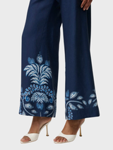 Stonewashed blue cropped leather straight leg pants by Montoya, featuring a contemporary and chic silhouette.