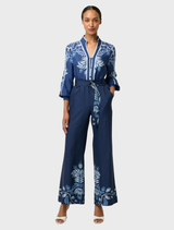 Stylish stonewashed blue cropped leather straight leg pants, perfect for adding a trendy touch to any outfit.