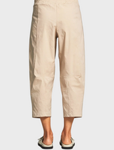 cropped pant highlighting a relaxed and trendy summer look.