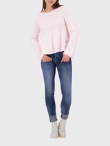 Light rose flared sweater with long sleeves, offering a relaxed fit and elegant drape for everyday style.