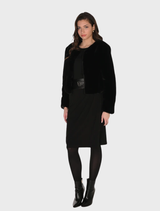 Versatile black knit skirt by Frank Lyman, designed for comfort and style, ideal for both casual and formal settings.