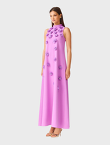 Modern purple halter gown with three-dimensional floral details, relaxed fit, and keyhole back, designed for elegant events.