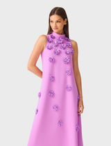 Sophisticated purple maxi dress featuring a halter neckline, floral accents, and a keyhole back, ideal for special occasions.