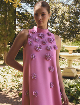 Sophisticated purple maxi dress featuring a halter neckline, floral accents, and a keyhole back, ideal for special occasions.