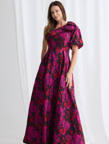 Soraya Dress in pink and black, featuring a stylish design suitable for various occasions.