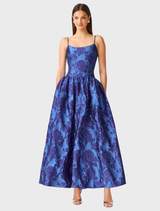 Striking cobalt blue A-line gown with a feminine neckline and graceful skirt, designed for black-tie celebrations and special events.