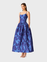 Floor-length cobalt blue gown with a fitted bodice, back shirring, and invisible zipper, perfect for weddings and formal occasions.