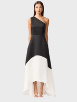A black and white dress crafted from a single piece of fabric, showcasing a seamless and elegant design.