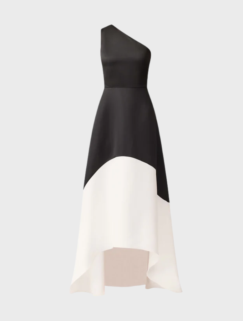 This black and white dress is elegantly made from one piece of fabric, emphasizing its simple yet chic design.