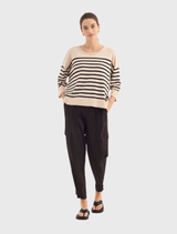 Soundtrack Pant in black, showcasing a soft cotton blend, adjustable cuffs, and practical cargo-inspired pockets for versatility.