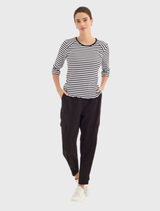 The Soundtrack Pant combines comfort and style with a soft cotton blend, adjustable cuffs, and practical cargo-inspired pockets.