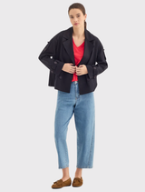 Soundtrack Jacket in ink, featuring a tailored fit, wide lapel, four-button front, and adjustable sleeve tabs for comfort.