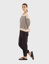 Black Soundtrack Pant featuring a relaxed 7/8 length, elasticated waistband, and cargo-inspired detailing for modern utility.
