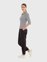 Soundtrack Pant in Ink features a relaxed 7/8 length, elasticated waistband, and cargo-inspired detailing for modern utility.