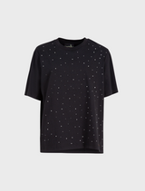 A black t-shirt with silver dots, featuring the Sparkle Magic design.
