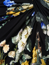 Ottoman elegance in a long dress with a split front and twist detail, perfect for formal occasions.