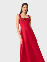 Red Lucetta square neck fit and flare midi dress displayed on a mannequin, showcasing its elegant silhouette and design.