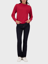 Elegant stand-up collar top in chimney red, ideal for adding a pop of color to both casual and professional looks.