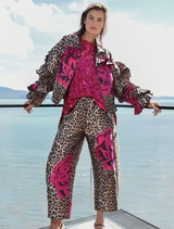 Contemporary leopard floral trousers featuring a textured jacquard fabric and a comfortable elasticated back waistband.