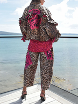 Eye-catching leopard floral trousers with a flexible waistband, designed for a contemporary look and everyday comfort.