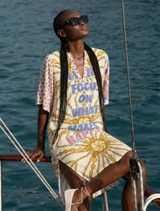 Stephanie Placked Maxi Dress from Markers collection, featuring "I'LL FOCUS ON WHAT MAKES ME HAPPY" in vibrant colors.