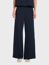 Lightweight navy and chalk striped suit pants featuring a clean waistband, elastic back, and front pockets for a stylish fit.