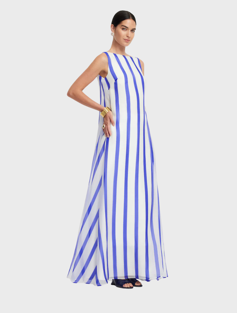 Yumei's navy striped gown showcases an open back, perfect for adding flair to evening events.