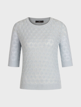 Light blue pullover sweater featuring a round neckline and structured design.