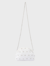 A sleek white clutch bag with silver studs, combining sophistication and contemporary style.